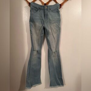 Light blue flared distressed jeans high rise